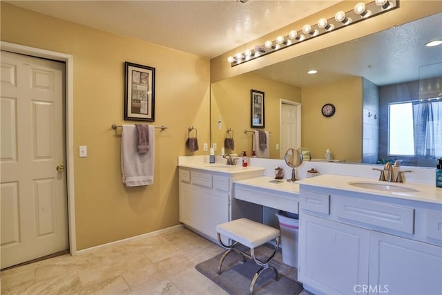 bathroom featuring vanity and tile patterned flooring