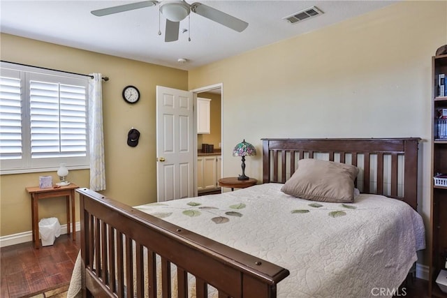 bedroom featuring ceiling fan and dark hardwood / wood-style floors