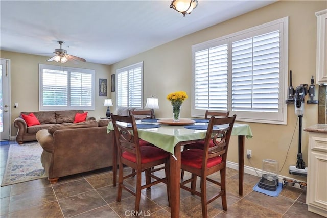 dining room with ceiling fan