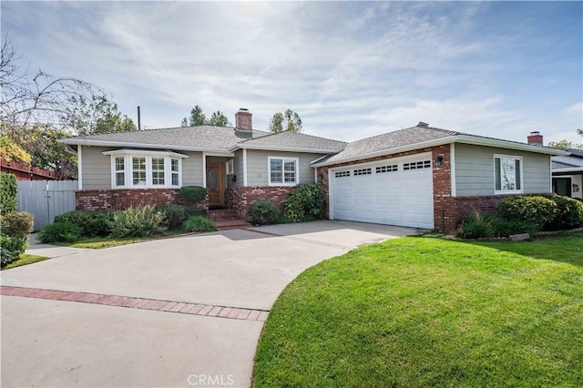 view of front facade featuring a front lawn and a garage