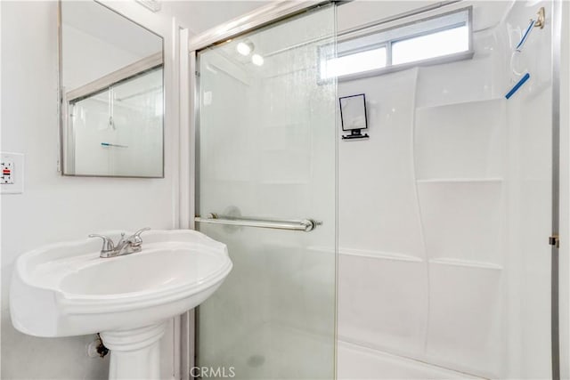 full bathroom featuring a stall shower