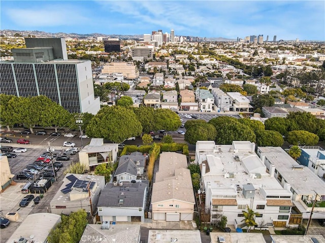 drone / aerial view featuring a city view