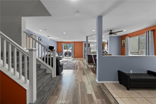 foyer entrance featuring stairs, recessed lighting, ceiling fan, and wood finished floors