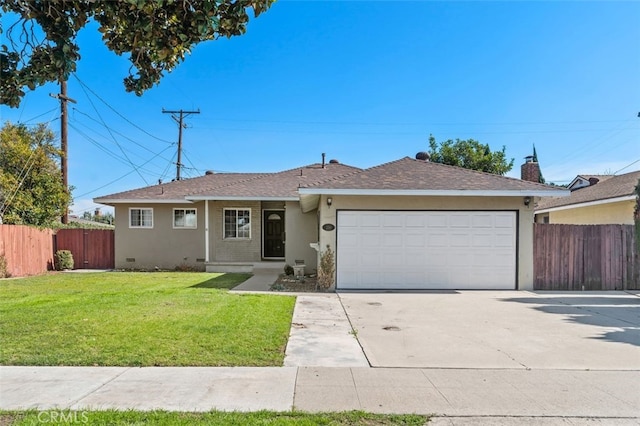 ranch-style house with a garage and a front yard