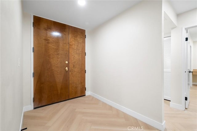 hallway with light parquet flooring