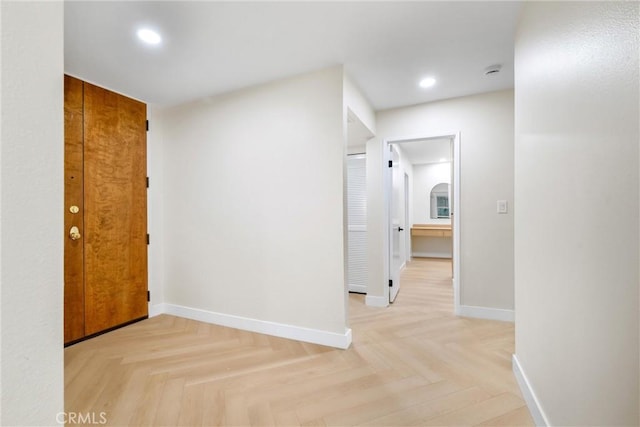 hallway featuring light parquet floors