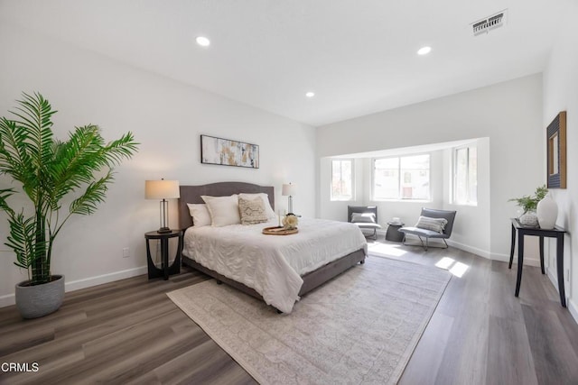 bedroom featuring dark hardwood / wood-style floors