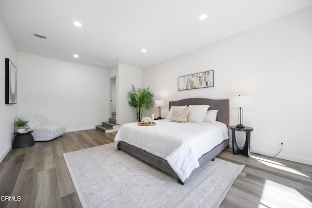 bedroom featuring wood-type flooring