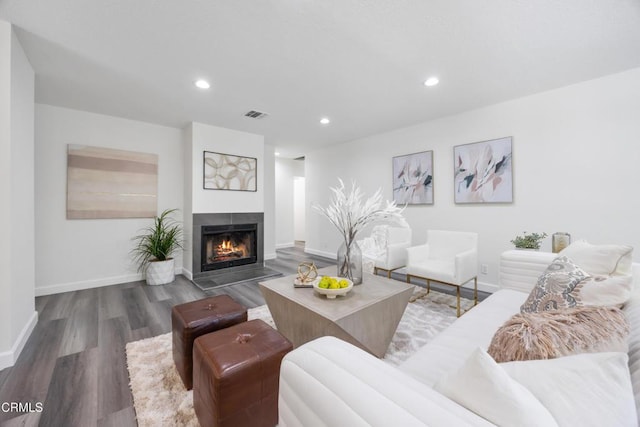 living room featuring dark wood-type flooring