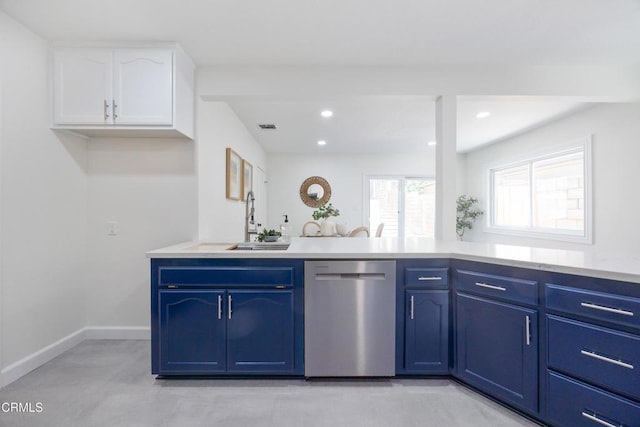 kitchen with sink, dishwasher, white cabinetry, and blue cabinetry