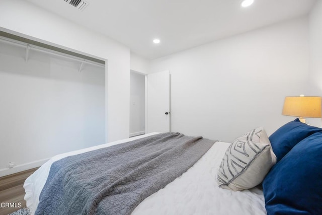 bedroom featuring hardwood / wood-style floors