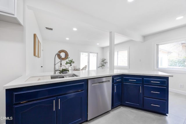 kitchen with sink, kitchen peninsula, blue cabinets, and dishwasher