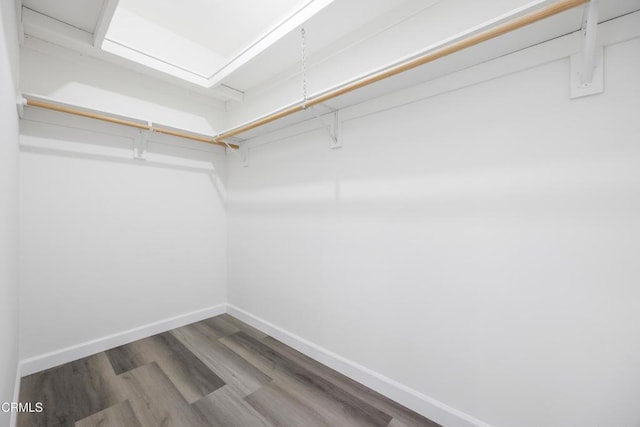 walk in closet featuring hardwood / wood-style floors