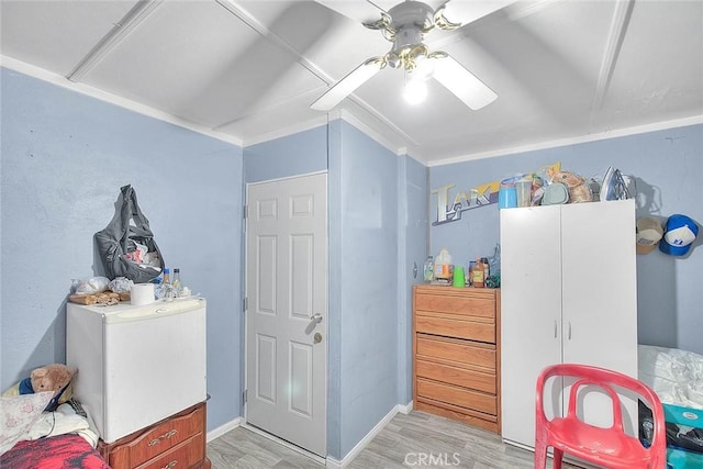 946 E J St, Ontario, CA 91764 - bedroom with a ceiling fan and light wood-style flooring