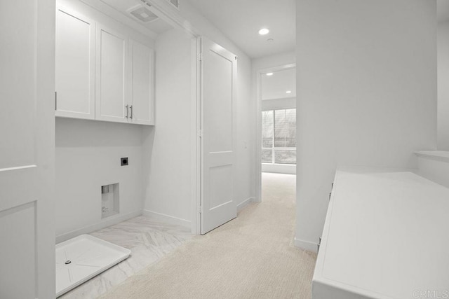laundry area featuring cabinet space, baseboards, hookup for an electric dryer, and recessed lighting