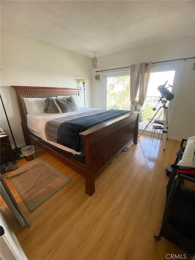 bedroom featuring light wood-type flooring