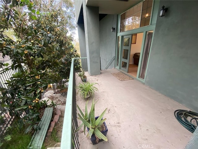 view of patio / terrace with a balcony