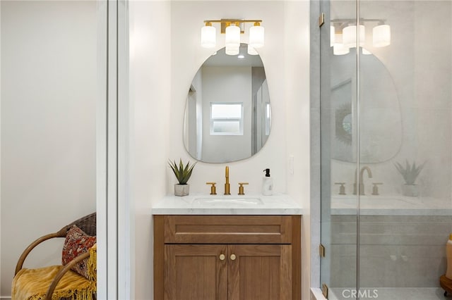 full bathroom with a stall shower and vanity