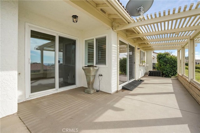 view of patio / terrace featuring a pergola