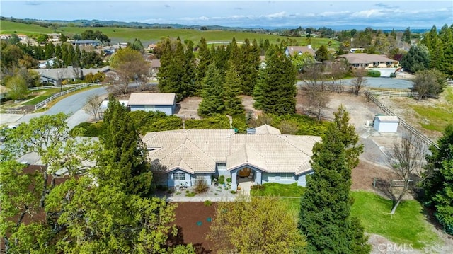 birds eye view of property with a residential view