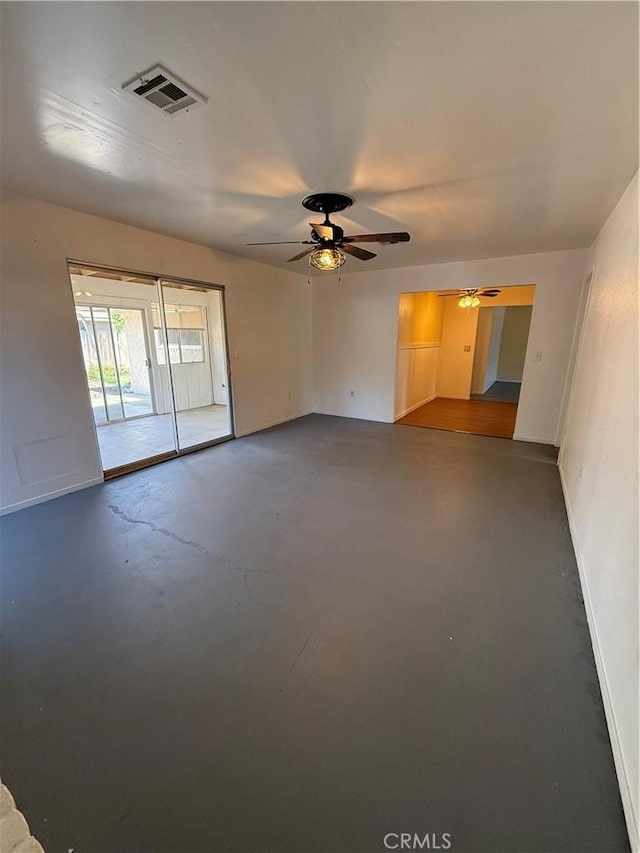 749 Junipero Ct, Merced, CA 95348 - empty room featuring a ceiling fan, concrete flooring, and visible vents