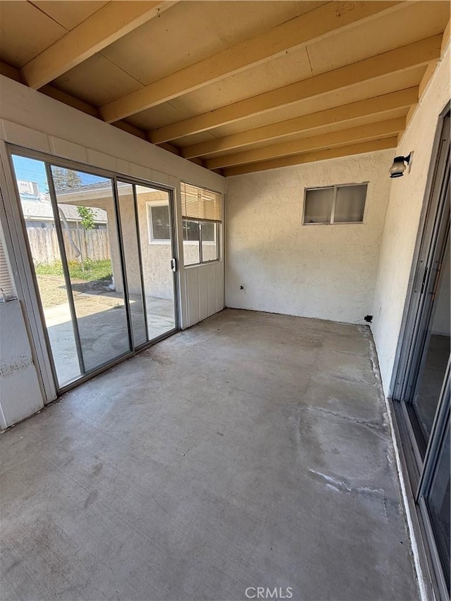 749 Junipero Ct, Merced, CA 95348 - unfurnished sunroom with beamed ceiling