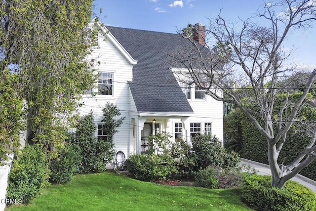 view of front of home with a front yard