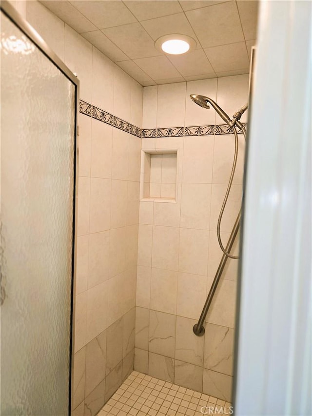 full bathroom with a stall shower