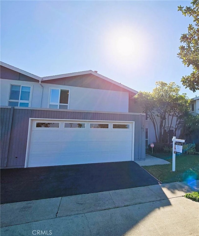 view of front of house featuring a garage and driveway