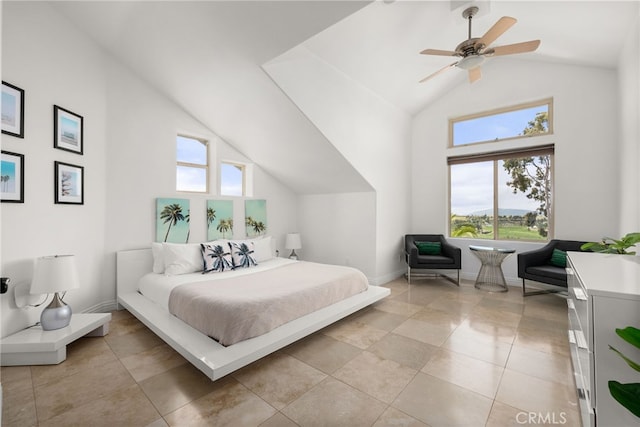 tiled bedroom featuring multiple windows, high vaulted ceiling, and ceiling fan