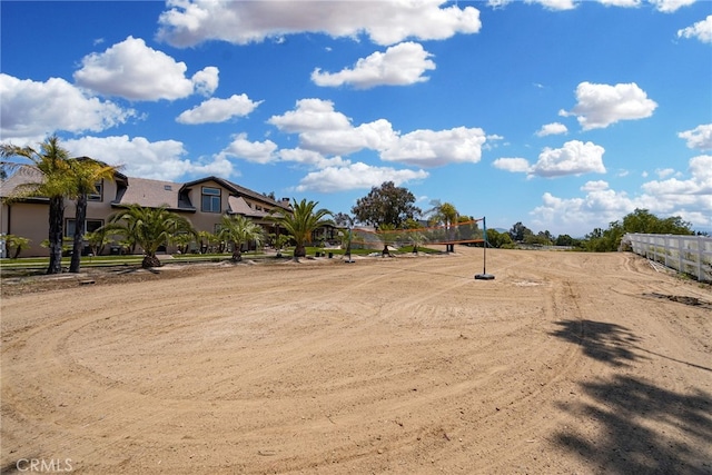 view of yard featuring volleyball court