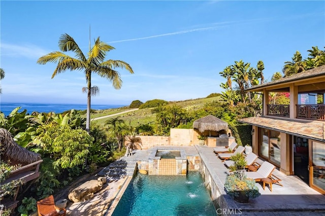 outdoor pool featuring a patio