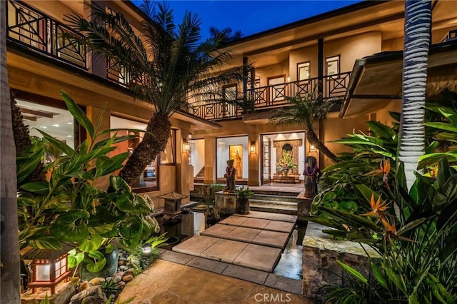 doorway to property with a balcony