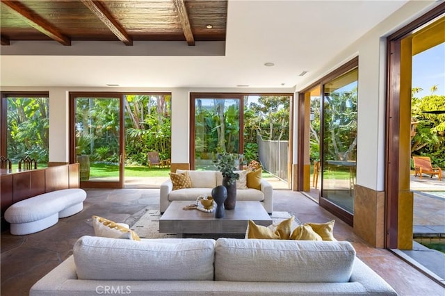 sunroom with wood ceiling and beam ceiling