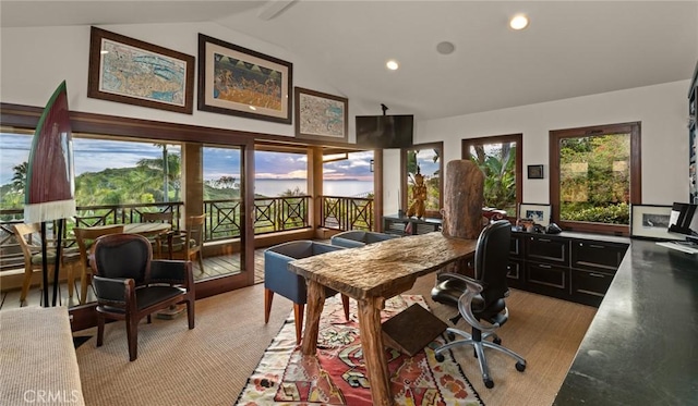 office space featuring high vaulted ceiling, a wealth of natural light, and recessed lighting