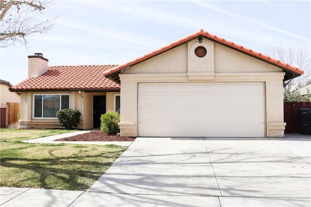 view of front facade featuring a garage and a front yard