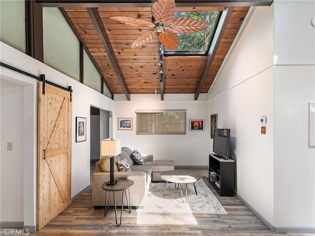 living room featuring baseboards, high vaulted ceiling, a barn door, dark wood-style floors, and wood ceiling