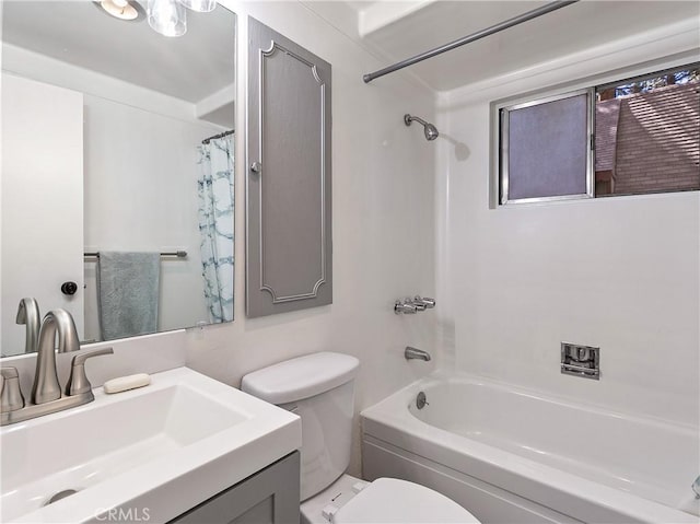 bathroom with vanity,  shower combination, and toilet