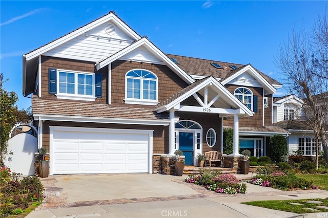 craftsman inspired home with a garage