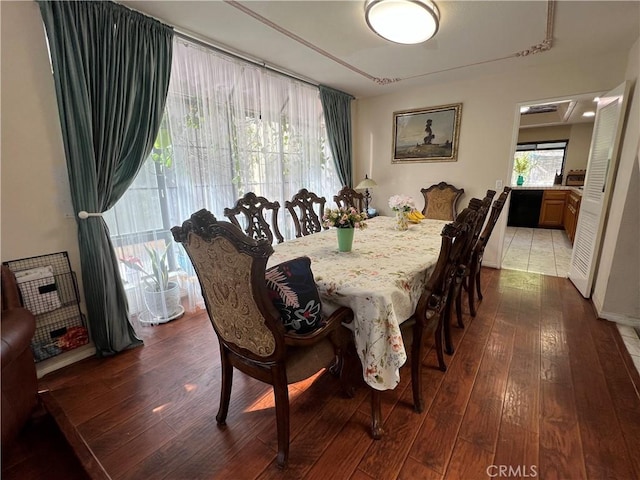 dining room featuring dark hardwood / wood-style floors