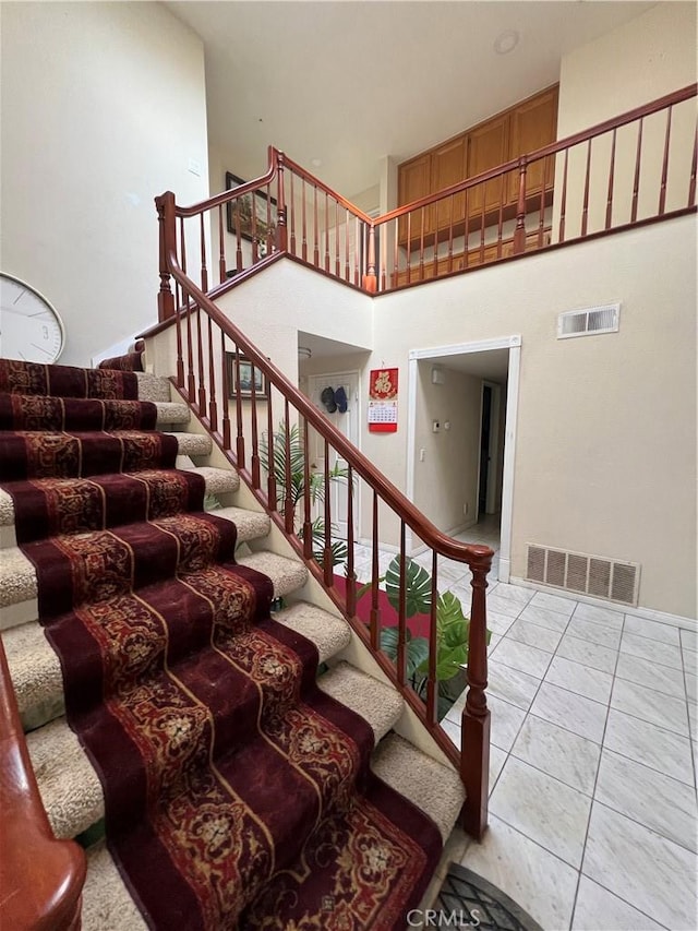 stairs with a towering ceiling