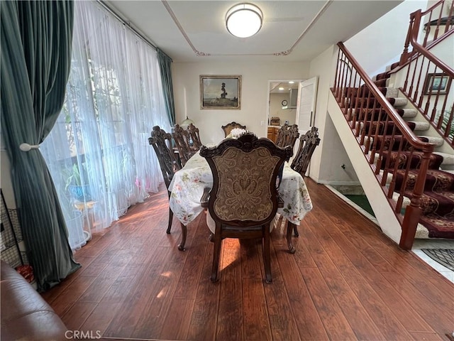 dining area with wood-type flooring