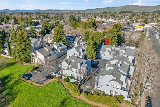 aerial view featuring a mountain view and a residential view