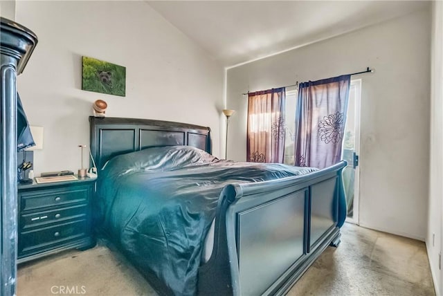 bedroom featuring lofted ceiling