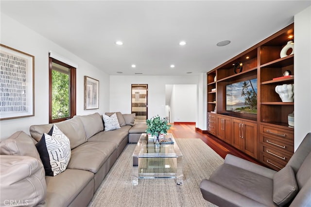 2907 Cliff Dr, Newport Beach, CA 92663 - living area featuring dark wood-type flooring and recessed lighting