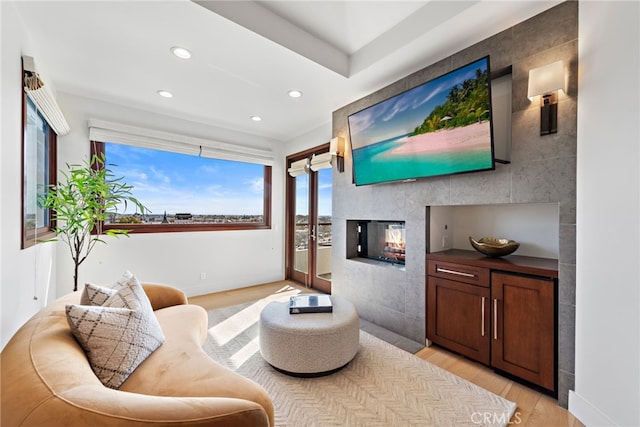 2907 Cliff Dr, Newport Beach, CA 92663 - living area with recessed lighting, light wood-style flooring, a fireplace, and baseboards