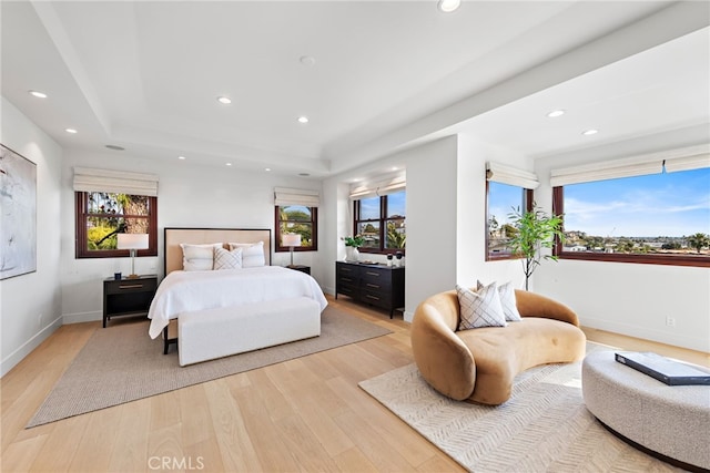 2907 Cliff Dr, Newport Beach, CA 92663 - bedroom with multiple windows, light wood finished floors, recessed lighting, and a raised ceiling