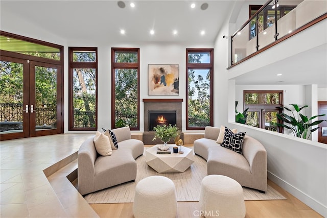 2907 Cliff Dr, Newport Beach, CA 92663 - living area featuring a warm lit fireplace, recessed lighting, and baseboards
