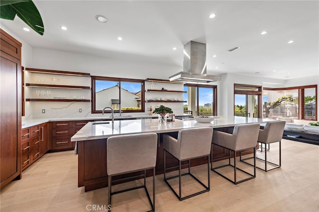 2907 Cliff Dr, Newport Beach, CA 92663 - kitchen featuring open shelves, recessed lighting, open floor plan, a spacious island, and a sink