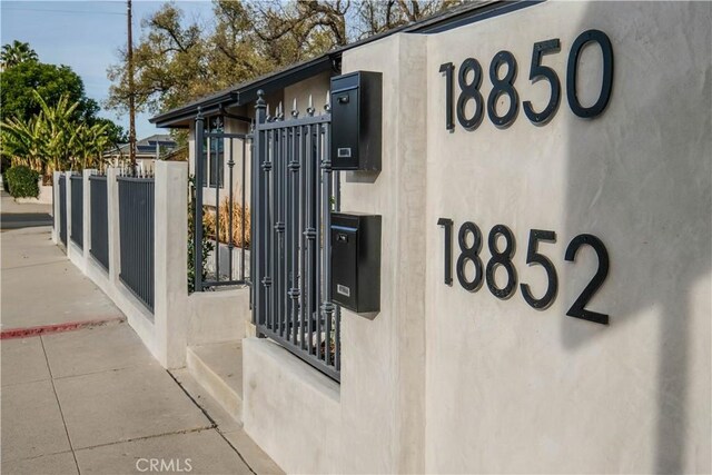 18848 Collins St, Tarzana, CA 91356 - exterior view of stucco siding and fence